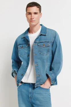 Blouson en denim d&eacute;lav&eacute; moyen fonc&eacute;