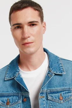 Blouson en denim d&eacute;lav&eacute; moyen fonc&eacute;