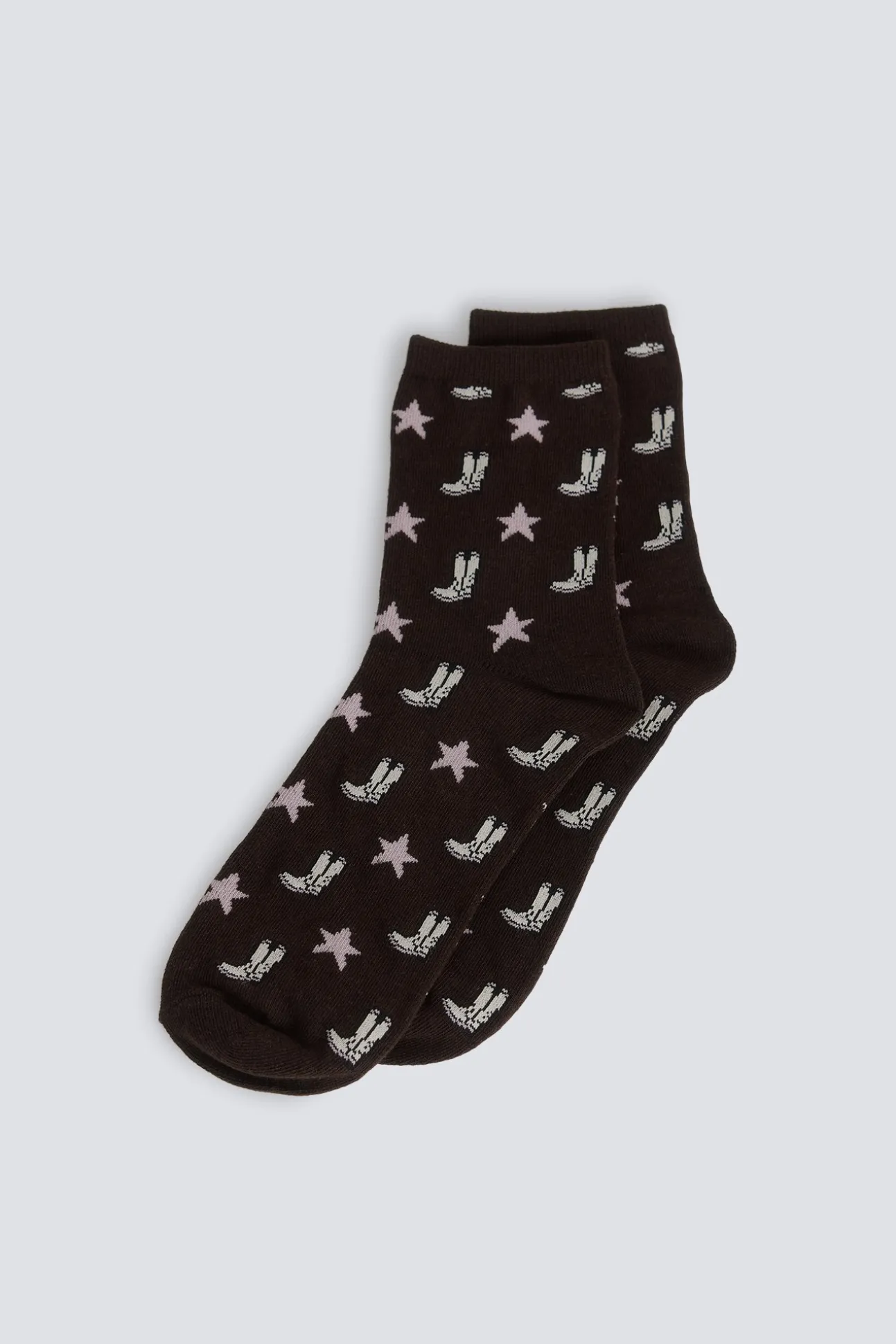 Chaussette longue à motifs bottes et étoiles