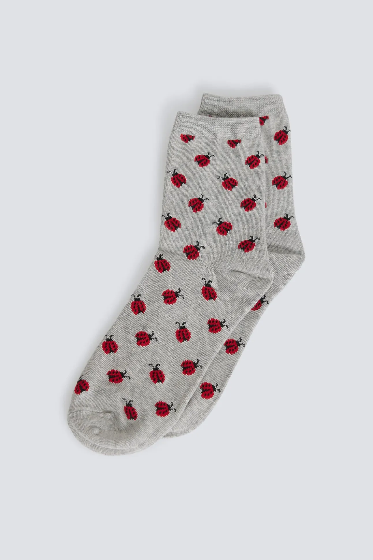 Chaussette longue à coccinelles