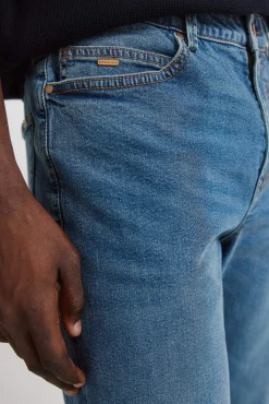 Jeans d&eacute;lavage moyen fonc&eacute; coupe skinny