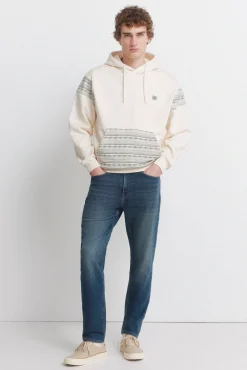 Jeans en knit denim surteint coupe slim