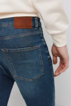 Jeans en knit denim surteint coupe slim