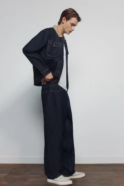 jeans larges d&eacute;lav&eacute;s lav&eacute; d&eacute;sencoll&eacute;