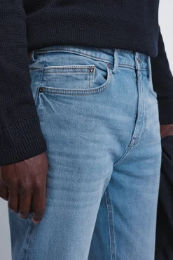 Jeans slim à délavage moyen
