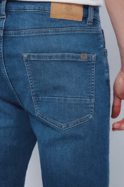 Jeans slim en denim tricoté