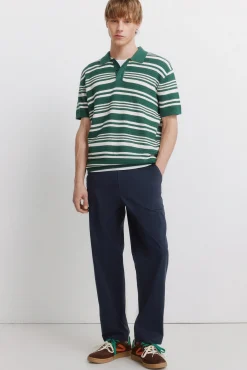Polo en maille structur&eacute;e &agrave; rayures