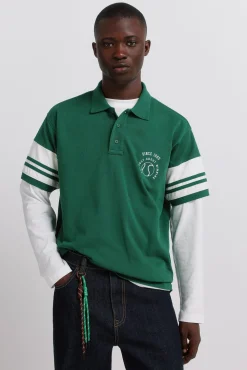 Polo en piqué à manches à blocs de couleur contrastants coupe droite