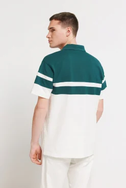 Polo en piqu&eacute; &agrave; coupes regular fit