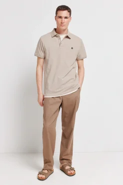 Polo en piqu&eacute; coupe slim &agrave; poignets contrastants