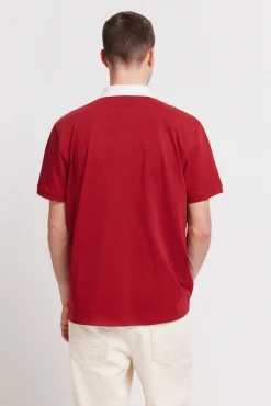 Polo sport en piqu&eacute; coupe positionnelle regular fit