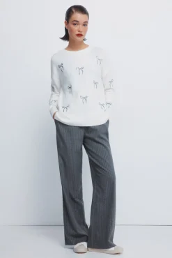 Pull avec n&oelig;uds &agrave; paillettes
