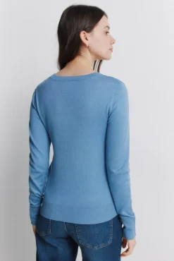 Pull fin boutons poignets